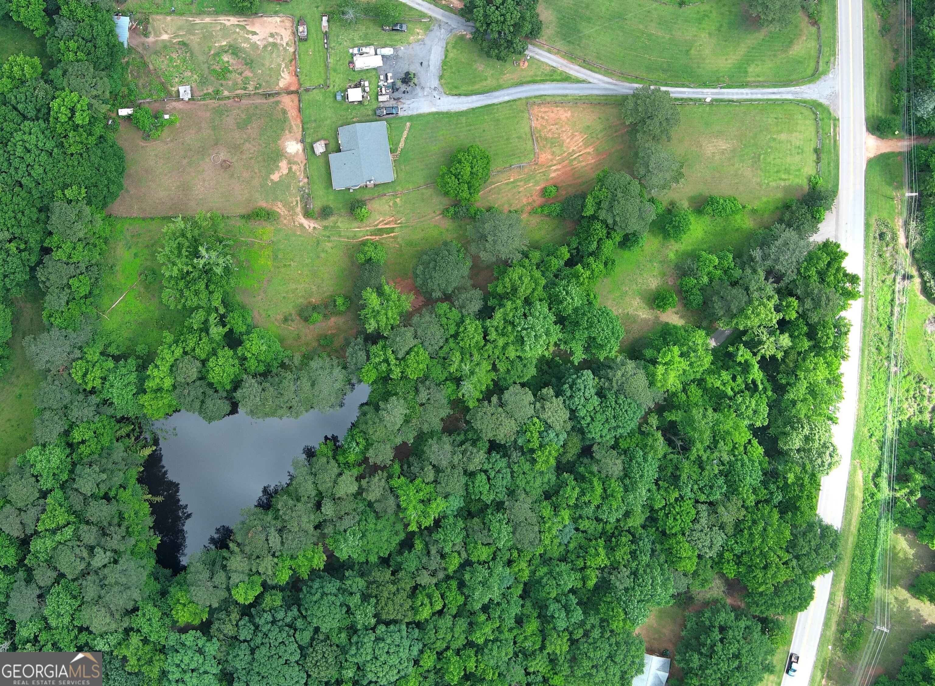 491 Thurman Road, Unit TRACT C Stockbridge, GA 30281 - Photo 6 of 18 an aerial view of a house with a yard