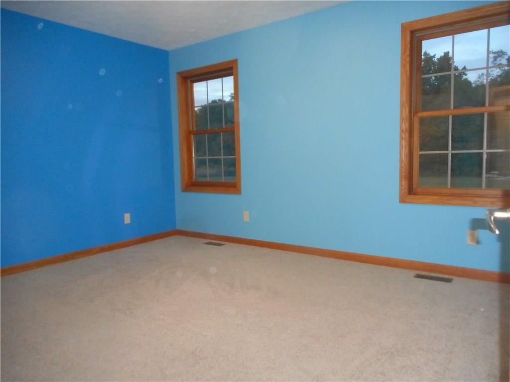 130 Vance Road New Castle, PA 16102 - Photo 11 of 25 14x11 bedroom with walk-in closet and view of pool, deck and back acreage.