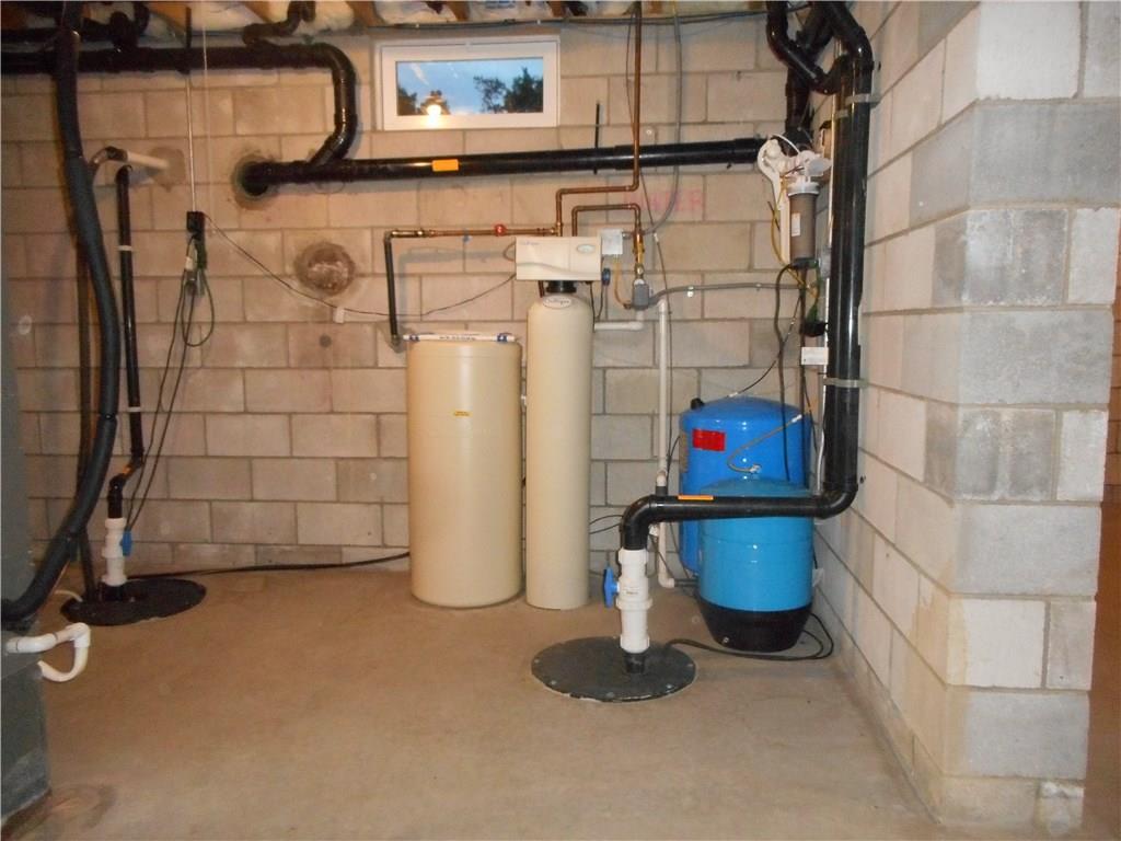 130 Vance Road New Castle, PA 16102 - Photo 19 of 25 Osmosis water filtration with UV light and Culligan water softener. 2 sumps one for a backup if a failure occurs. Notice the thickness of the foundation walls!