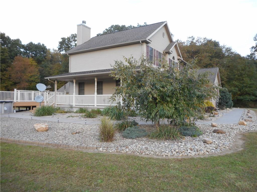130 Vance Road New Castle, PA 16102 - Photo 24 of 25 Side view showing the extensive professional landscaping.