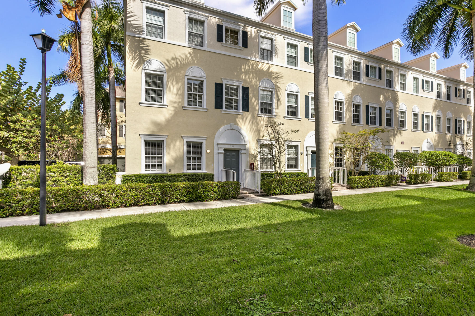 front view of a building with a yard