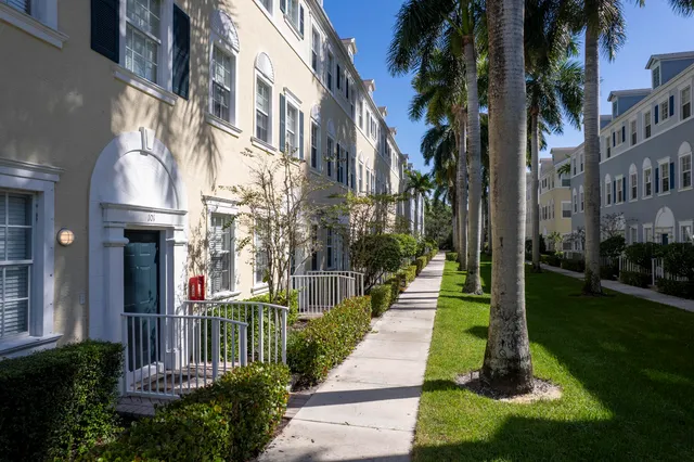 a view of a building with a yard
