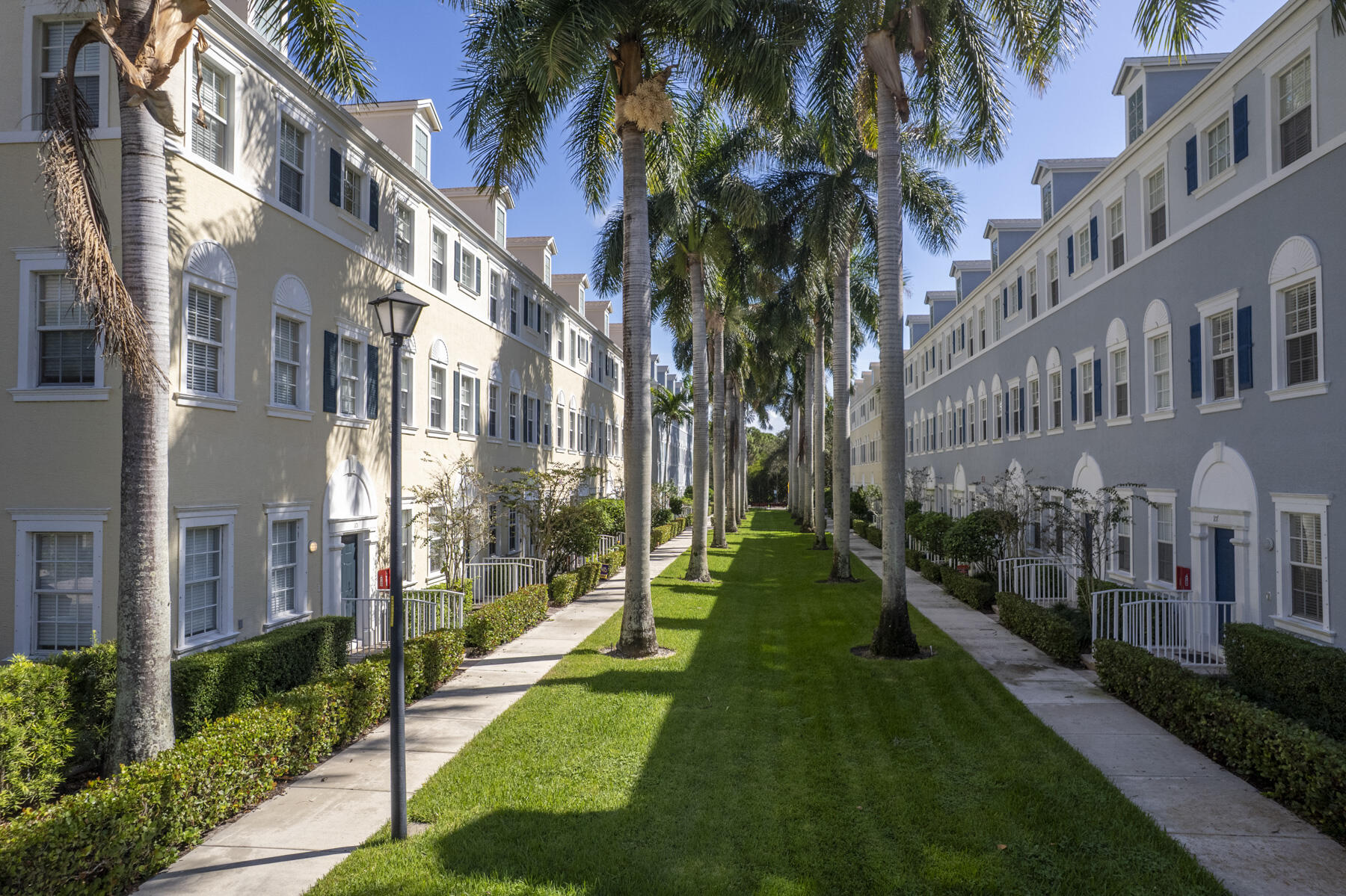 114 Locustberry Lane, Unit 101 Jupiter, FL 33458 - Photo 59 of 59 a view of a building with a yard