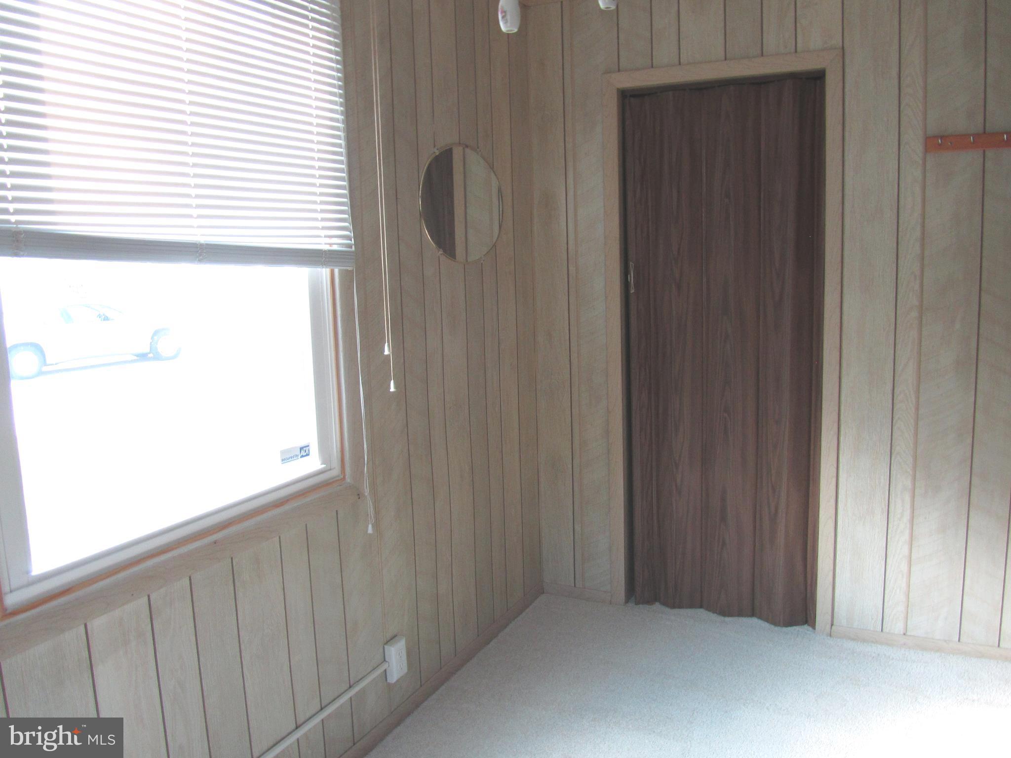 1909 Jefferson Road Baltimore, MD 21222 - Photo 17 of 22 a view of a small space and a window
