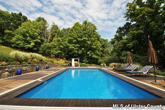 451 Scarawan Road Stone Ridge, NY 12484 - Photo 3 of 15 a view of a backyard with swimming pool