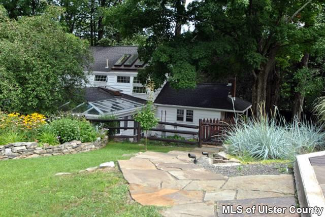 451 Scarawan Road Stone Ridge, NY 12484 - Photo 6 of 15 a backyard of a house with seating space