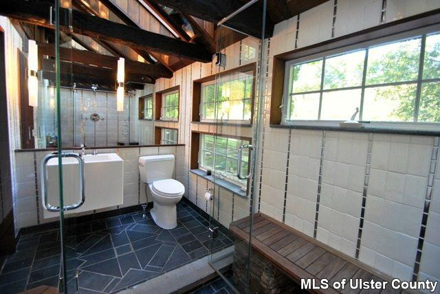 451 Scarawan Road Stone Ridge, NY 12484 - Photo 10 of 15 a bathroom with a toilet a sink and a shower
