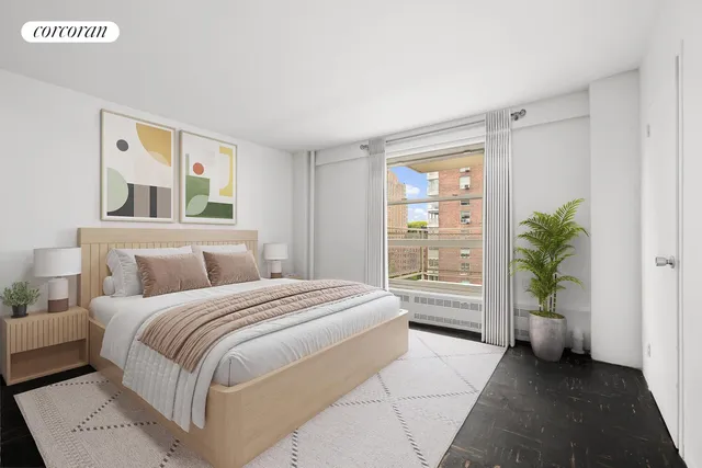 a bedroom with a bed and a potted plant