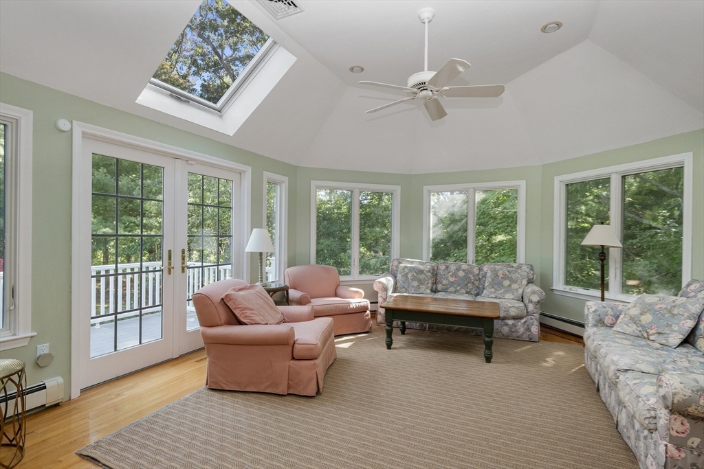 6 Heron Way Mashpee, MA 02649 - Photo 20 of 42 a living room with furniture and a large window