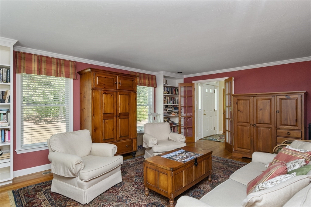 6 Heron Way Mashpee, MA 02649 - Photo 23 of 42 a living room with furniture and a large window