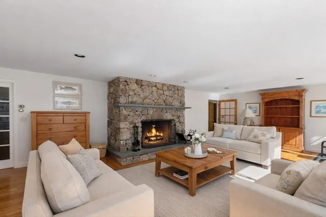 a bedroom with a large bed and a large window