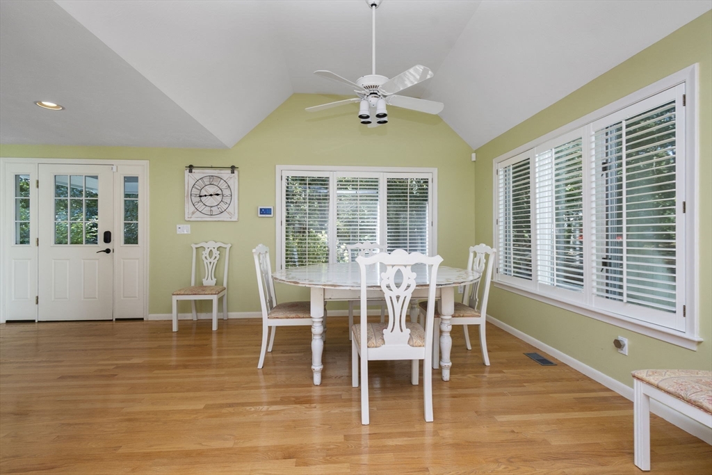 6 Heron Way Mashpee, MA 02649 - Photo 9 of 42 a view of a dining room with furniture window and wooden floor