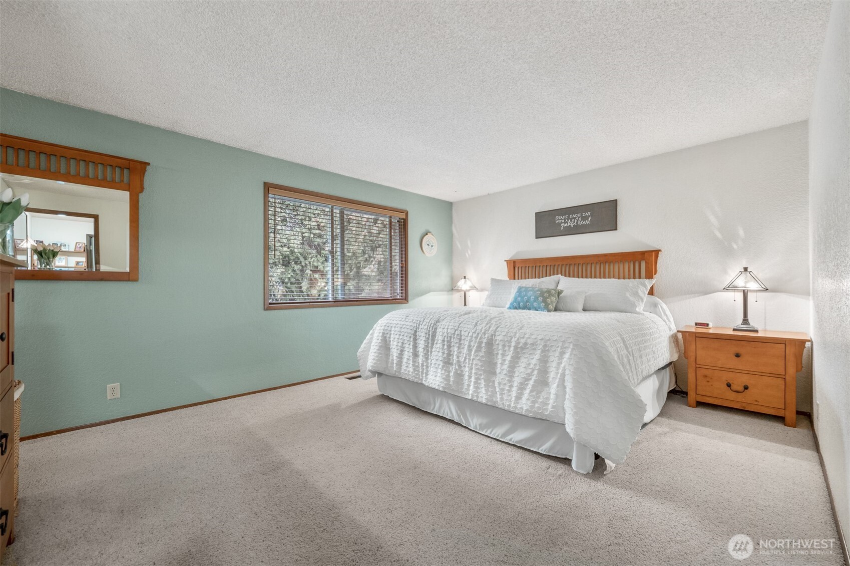 5582 Knight Road Bellingham, WA 98226 - Photo 30 of 39 a spacious bedroom with a bed and window