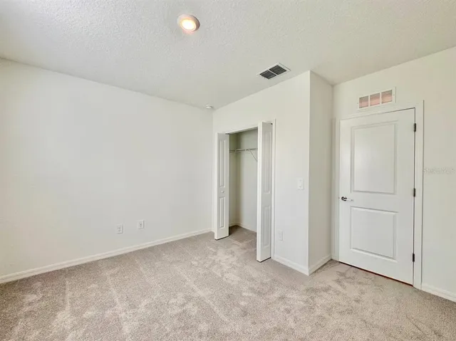 a bathroom with a sink toilet tub and shower