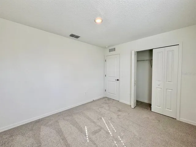 a bathroom with a double vanity sink mirror double and bathtub