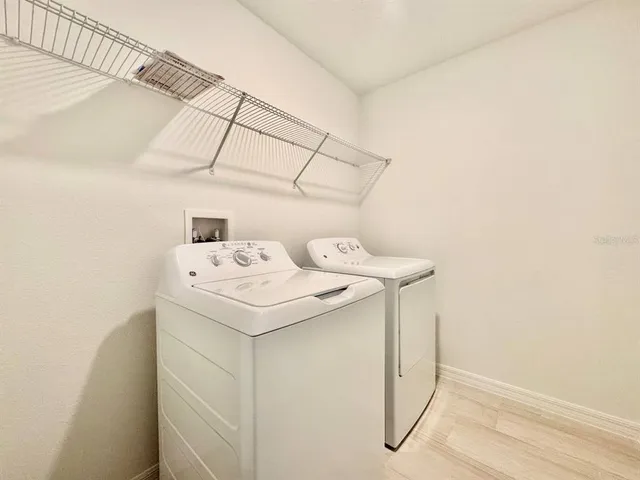 an empty room with a empty space and a window