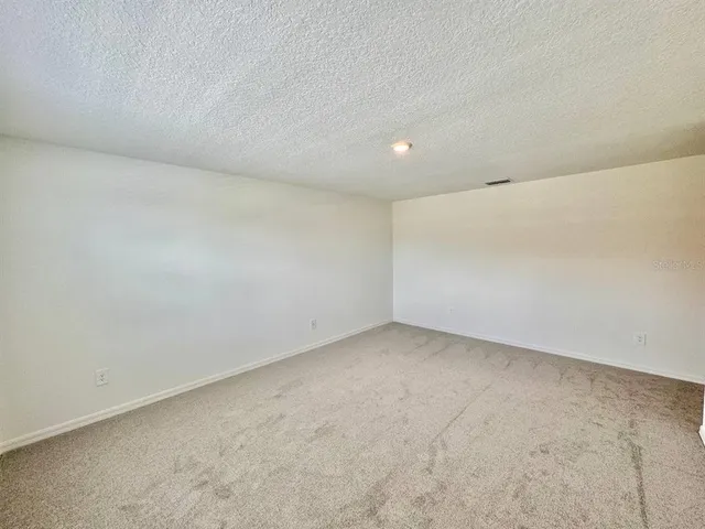 a bathroom with a double vanity sink mirror double and shower
