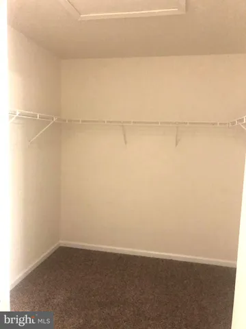 a view of bathroom with bathtub and window