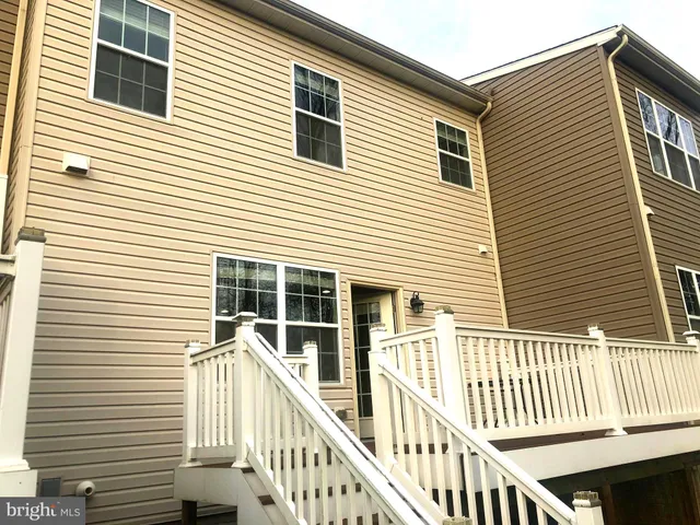 a bathroom with a tub and shower