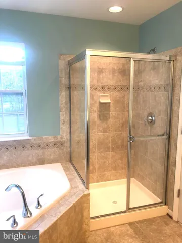 a view of a balcony with wooden floor