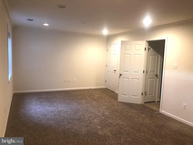 an empty room with an entryway