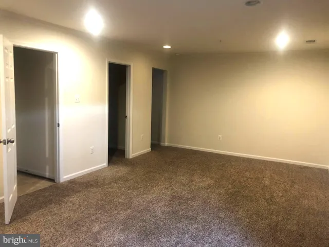 an empty room with an entryway