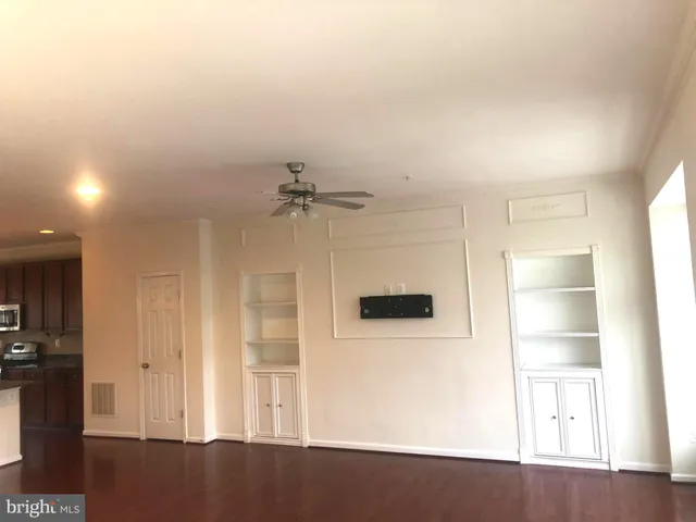 a view of a livingroom with a wooden floor