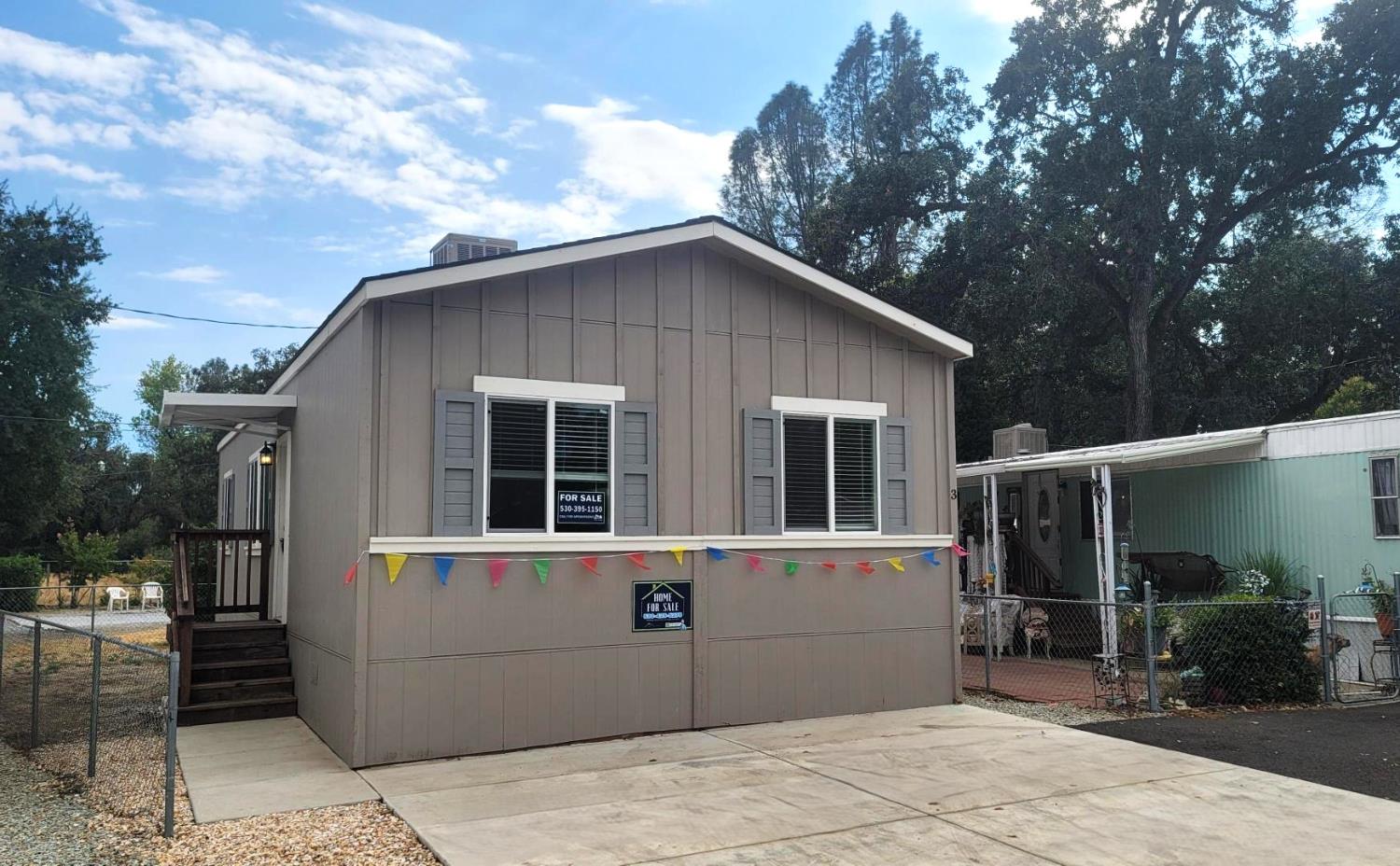 a front view of a house with a garage