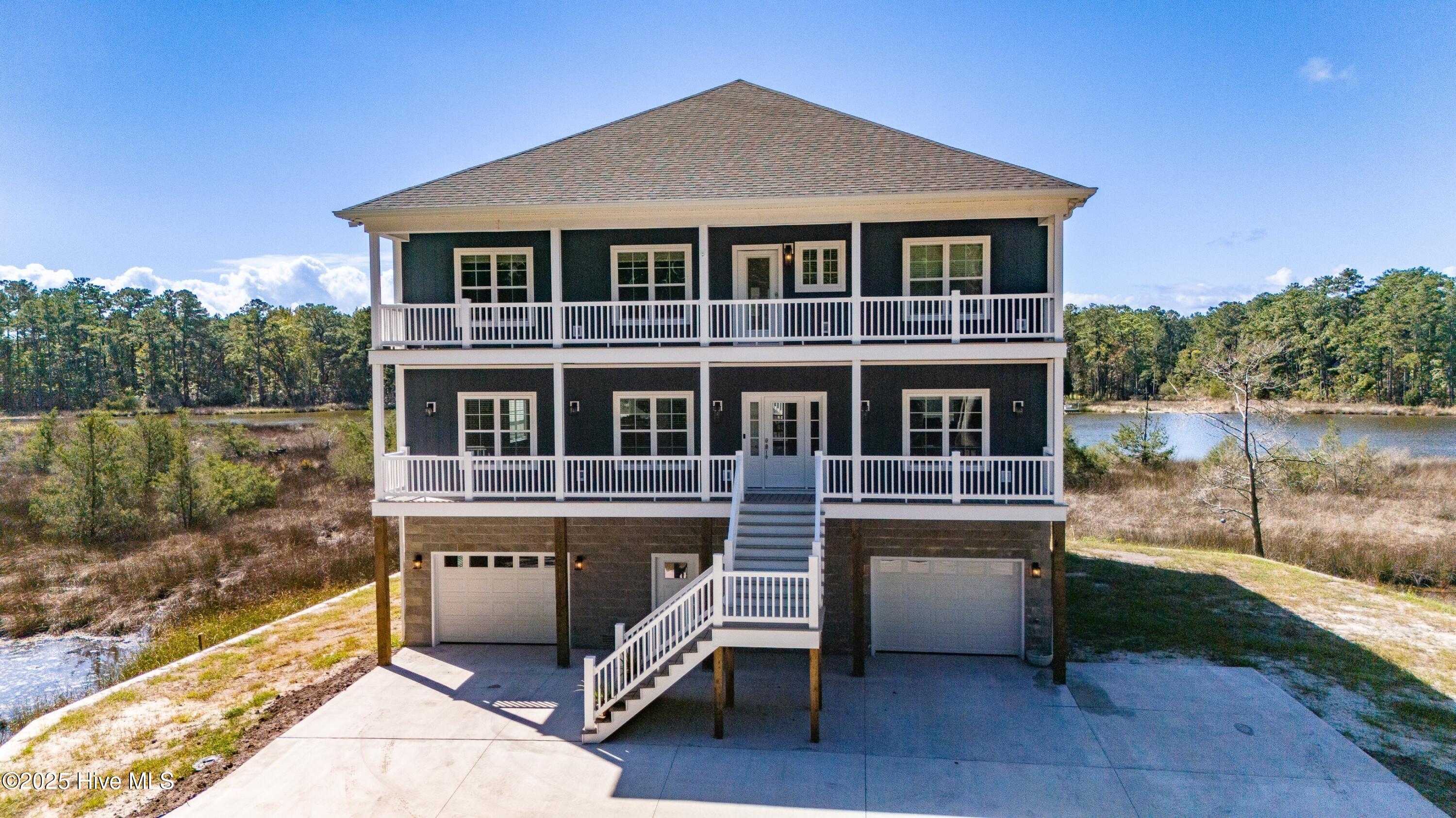 609 Bell Point Road Merritt, NC 28556 - Photo 2 of 60 002_Exterior FrontParking