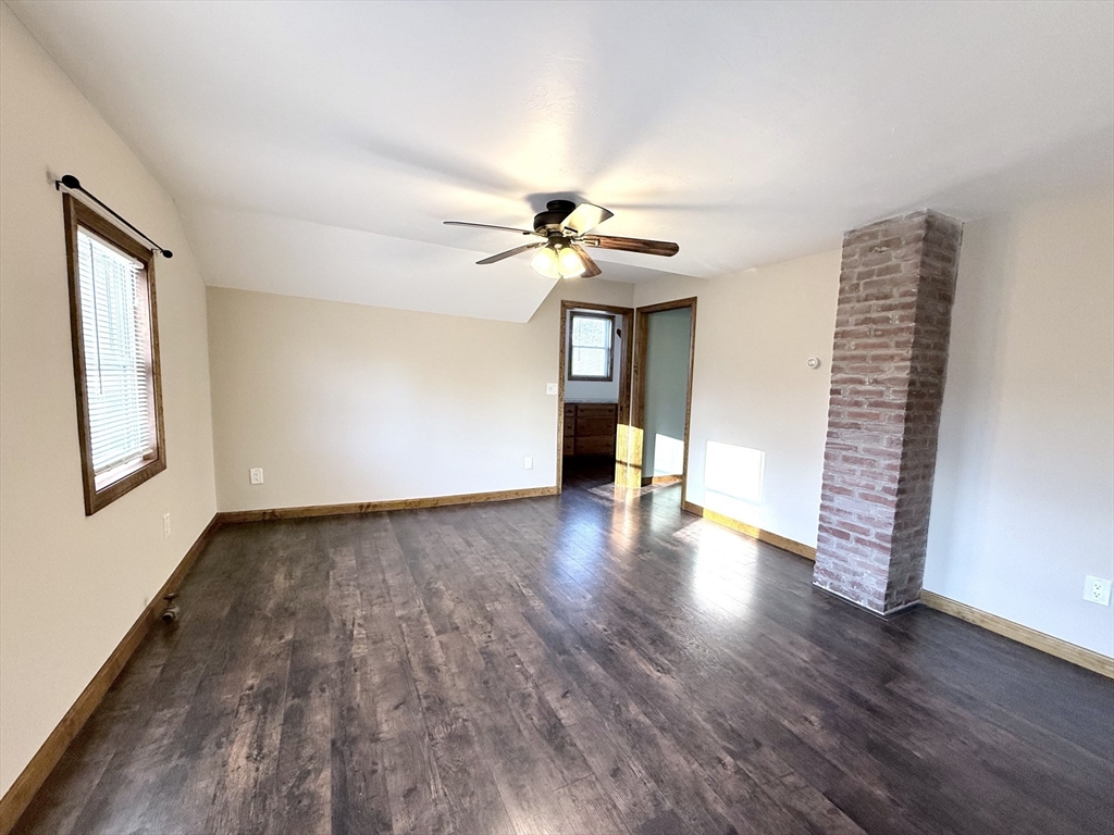 51 Brandon Road Dudley, MA 01571 - Photo 26 of 42 wooden floor in an empty room with a window