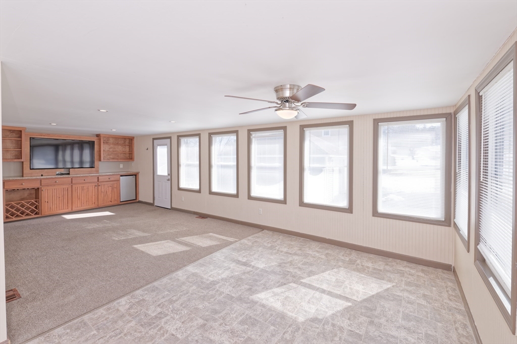 51 Brandon Road Dudley, MA 01571 - Photo 3 of 42 a view of an empty room with a window