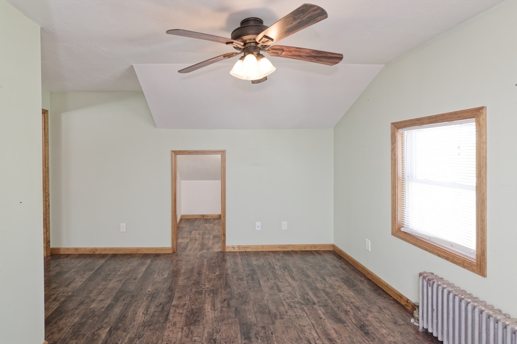 51 Brandon Road Dudley, MA 01571 - Photo 38 of 42 wooden floor in an empty room with a window