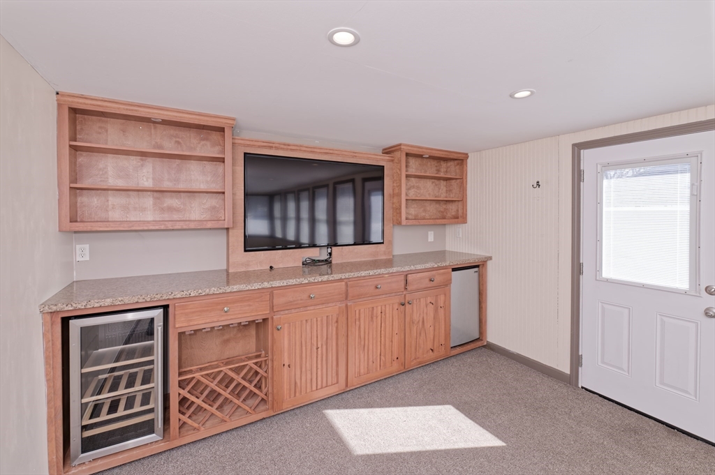 51 Brandon Road Dudley, MA 01571 - Photo 5 of 42 a kitchen with stainless steel appliances granite countertop a sink and cabinets