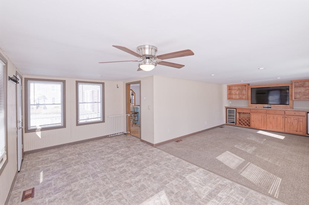 51 Brandon Road Dudley, MA 01571 - Photo 6 of 42 a view of an empty room with a window