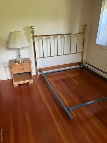 a front view of a house with sitting area