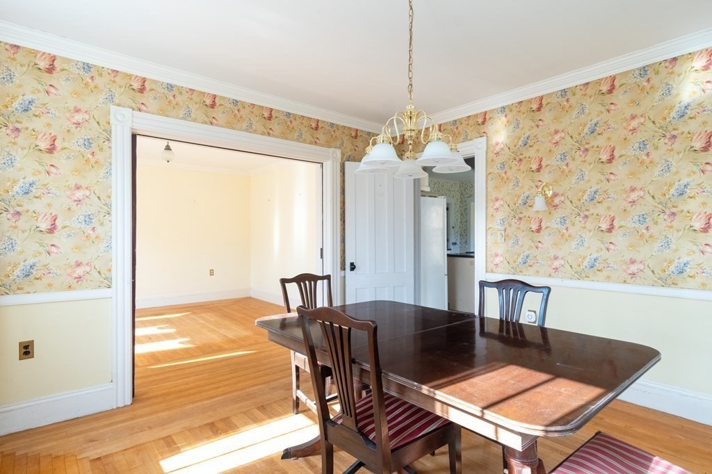 16 Hazelton Road Rowe, MA 01367 - Photo 13 of 33 a view of a dining room with furniture window and wooden floor