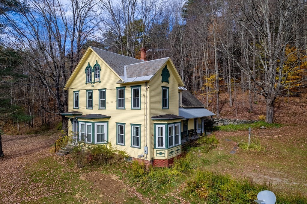 16 Hazelton Road Rowe, MA 01367 - Photo 2 of 33 a view of a yard in front of house