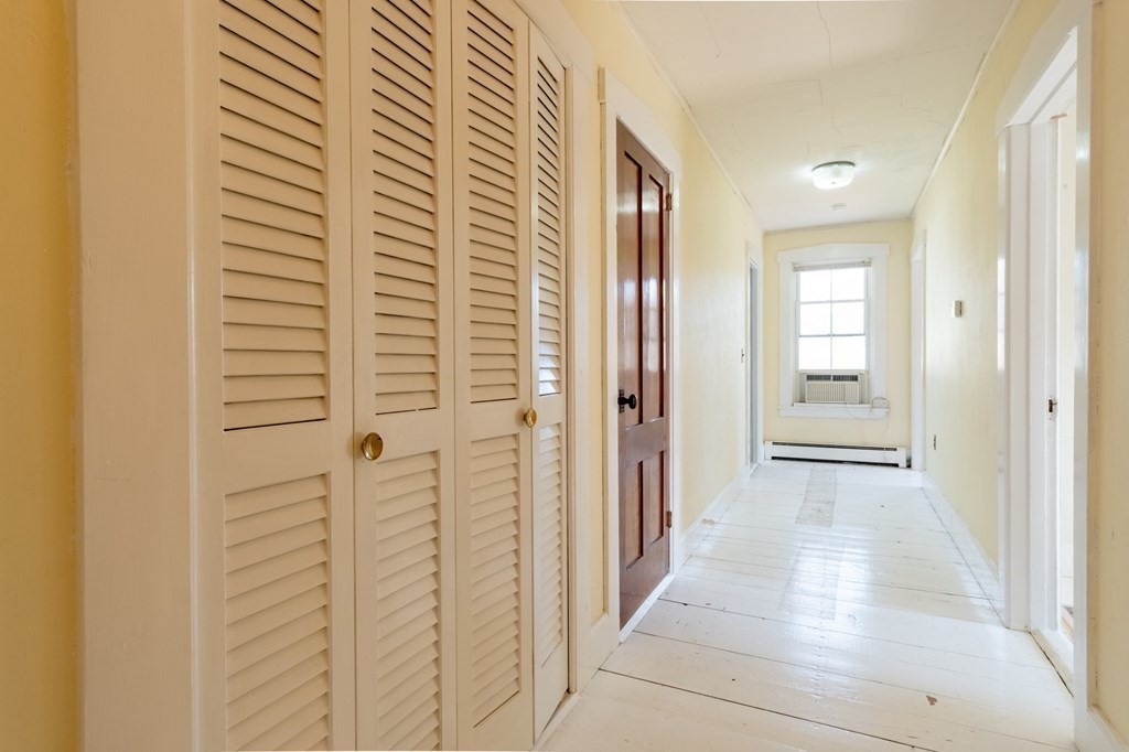 16 Hazelton Road Rowe, MA 01367 - Photo 23 of 33 a view of a bathroom from a hallway