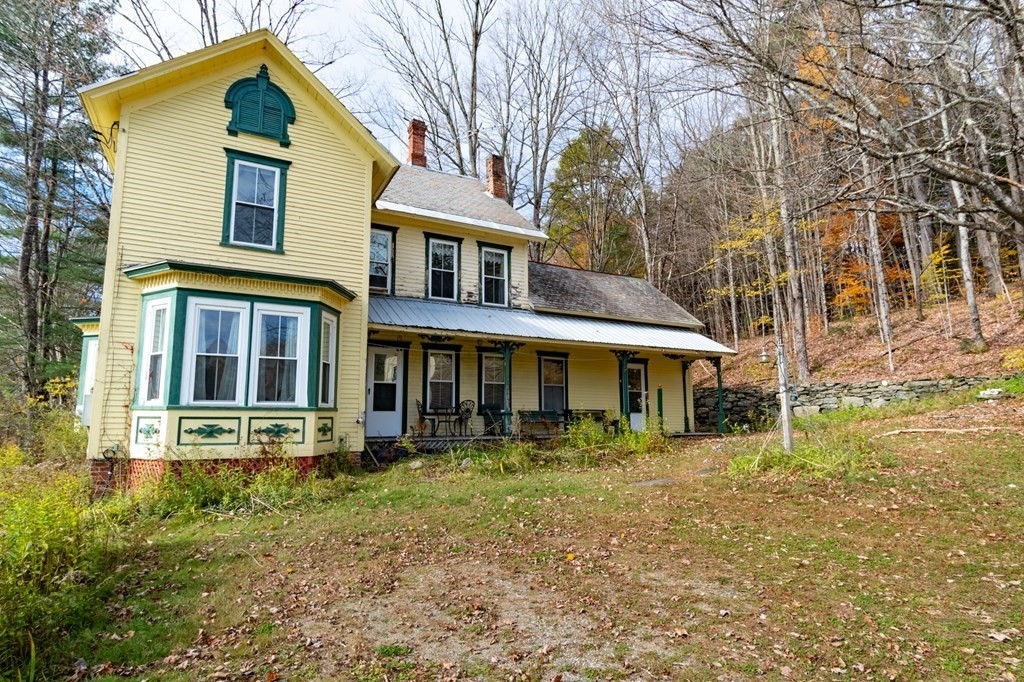 16 Hazelton Road Rowe, MA 01367 - Photo 8 of 33 front view of house with a yard