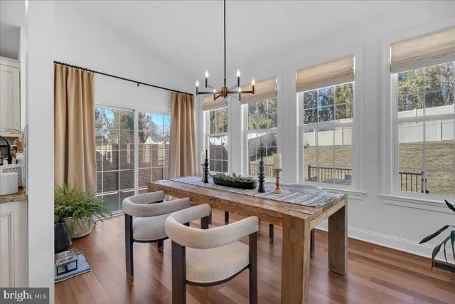 a view of entryway with wooden floor and stairs
