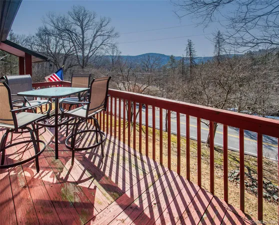 a view of a chairs on the roof deck