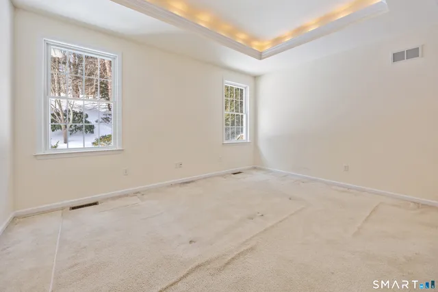 an empty room with windows