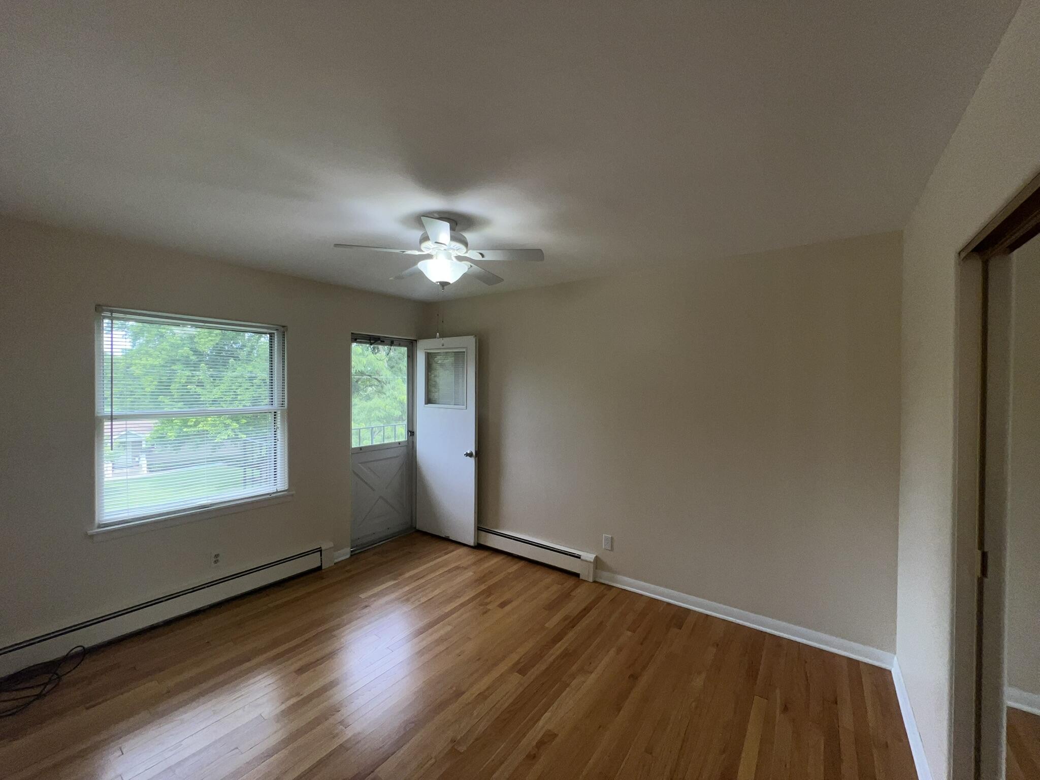 512 Hill Street, Unit 2S Walworth, WI 53184 - Photo 10 of 14 J. Bedroom 2 with Shared Balcony