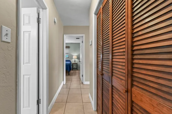 a view of a bathroom from a hallway