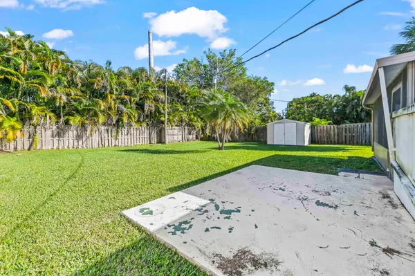 a view of a backyard with a garden