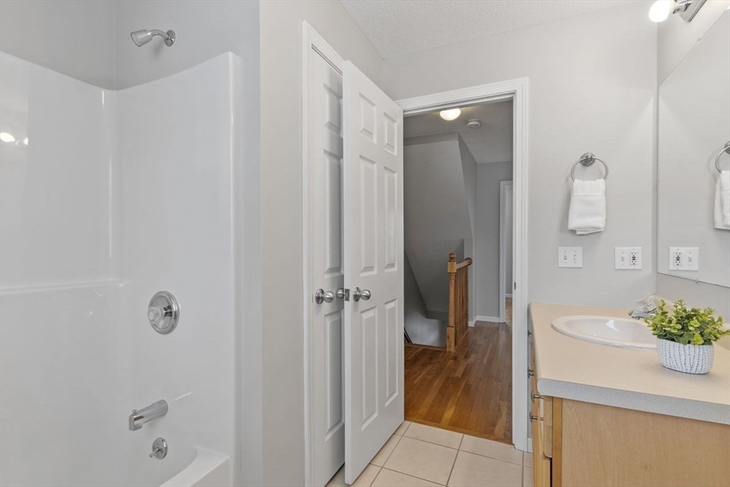 181 High Street, Unit 2 Andover, MA 01810 - Photo 12 of 32 a bathroom with a shower