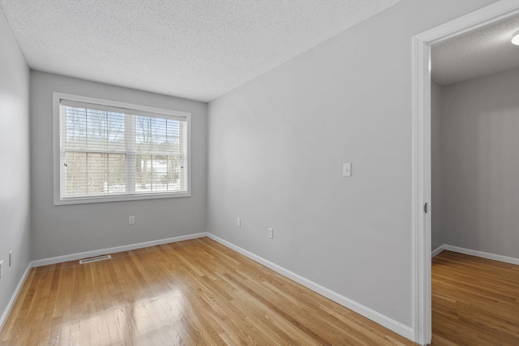 181 High Street, Unit 2 Andover, MA 01810 - Photo 13 of 32 an empty room with a window