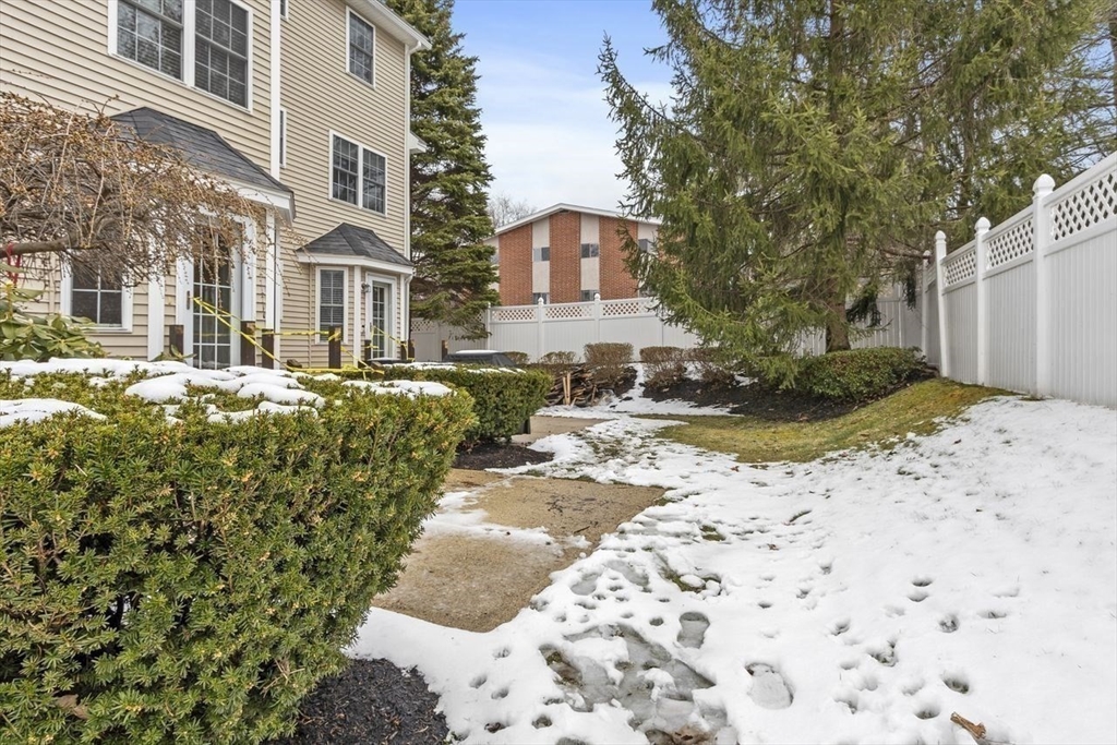 181 High Street, Unit 2 Andover, MA 01810 - Photo 24 of 32 a view of a street with a building in the background