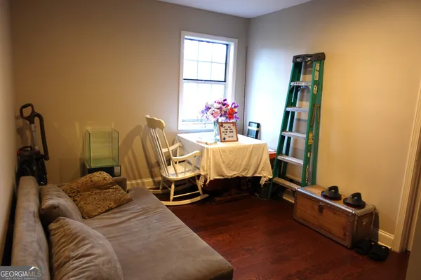 a bed room with a bed and a window