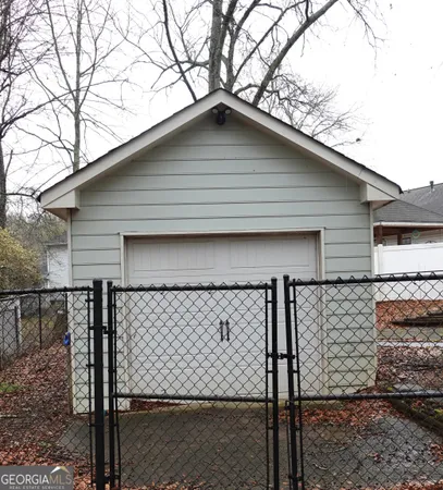 a house that has a tree in the background